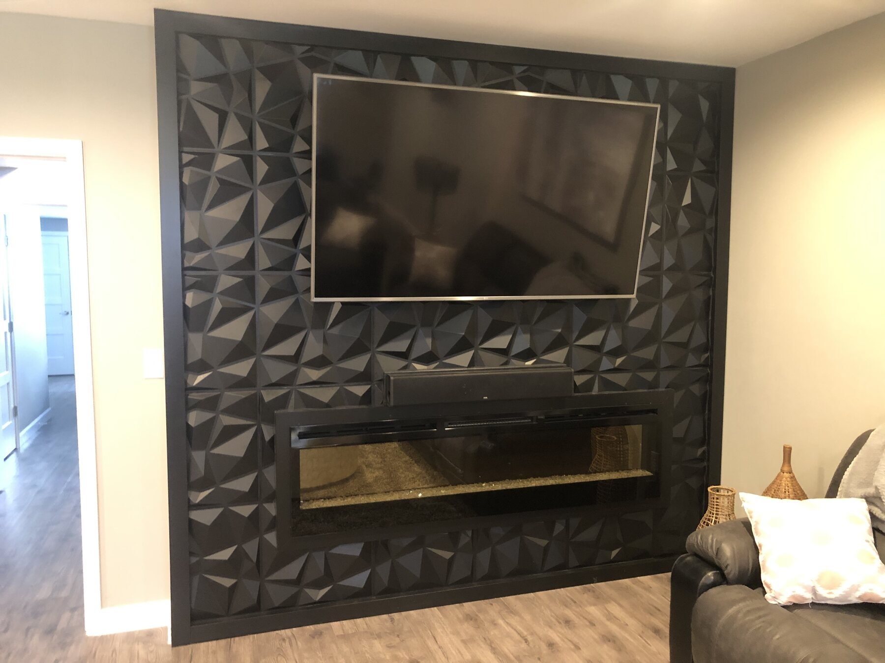 Built-in electric fireplace in the finished basement