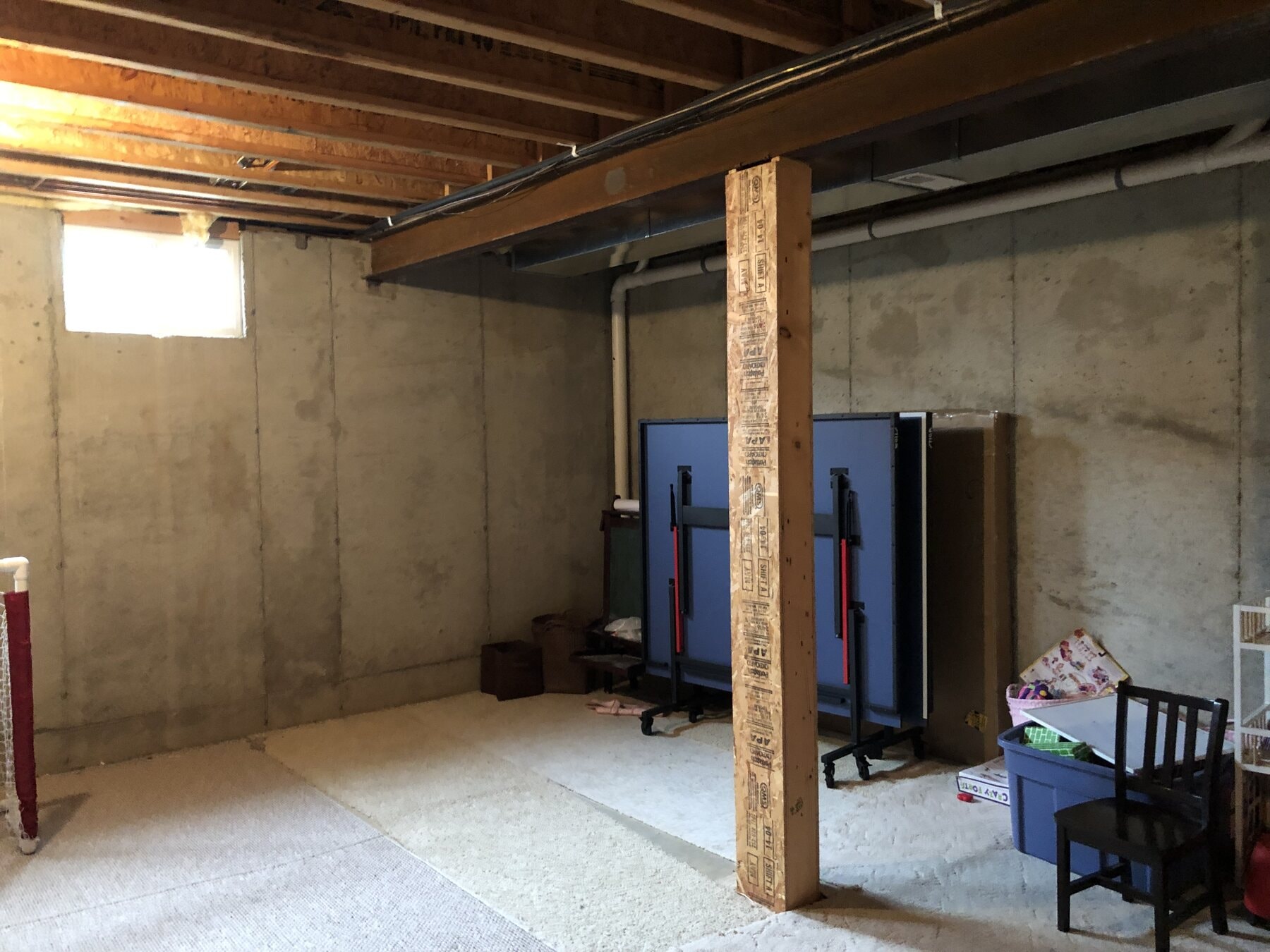 Unfinished basement before construction began